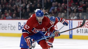 Dec 16, 2014; Montreal, Quebec, CAN; Montreal Canadiens forward Max Pacioretty (67) chases the puck during the third period against the Carolina Hurricanes at the Bell Centre. Mandatory Credit: Eric Bolte-USA TODAY Sports