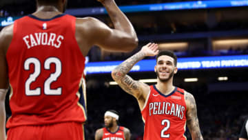 Lonzo Ball #2 of the New Orleans Pelicans congratulates Derrick Favors (Photo by Ezra Shaw/Getty Images)