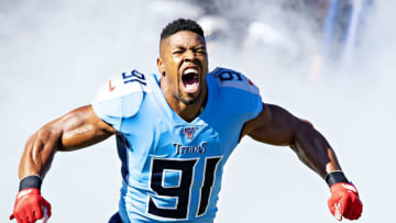 NASHVILLE, TN - NOVEMBER 10: Cameron Wake #91 of the Tennessee Titans runs onto the field with soldiers before a game against the Kansas City Chiefs at Nissan Stadium on November 10, 2019 in Nashville, Tennessee. The Titans defeated the Chiefs 35-32. (Photo by Wesley Hitt/Getty Images)