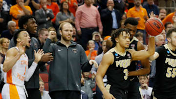 LOUISVILLE, KENTUCKY - MARCH 28: Carsen Edwards #3 of the Purdue Boilermakers reacts after he was fouled by Lamonte Turner #1 of the Tennessee Volunteers (left) during the closing seconds of the second half of the 2019 NCAA Men's Basketball Tournament South Regional at the KFC YUM! Center on March 28, 2019 in Louisville, Kentucky. (Photo by Kevin C. Cox/Getty Images)