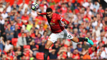 MANCHESTER, ENGLAND - OCTOBER 02: Chris Smalling of Manchester United heads the ball during the Premier League match between Manchester United and Stoke City at Old Trafford on October 2, 2016 in Manchester, England. (Photo by Richard Heathcote/Getty Images)