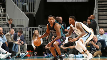 CHARLOTTE, NC - MARCH 22: Treveon Graham #21 of the Charlotte Hornets handles the ball against the Memphis Grizzlies on March 22, 2018 at Spectrum Center in Charlotte, North Carolina. NOTE TO USER: User expressly acknowledges and agrees that, by downloading and or using this photograph, User is consenting to the terms and conditions of the Getty Images License Agreement. Mandatory Copyright Notice: Copyright 2018 NBAE (Photo by Kent Smith/NBAE via Getty Images)