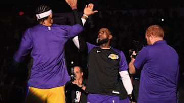 SAN DIEGO, CA - SEPTEMBER 30: LeBron James #23 of the Los Angeles Lakers high fives JaVale McGee #7 as he is introduced before a preseason game against the Denver Nuggets at Valley View Casino Center on September 30, 2018 in San Diego, California. (Photo by Harry How/Getty Images)