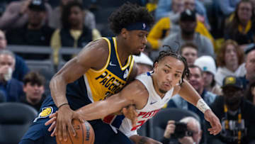 Indiana Pacers guard Terry Taylor (32) dribbles the ball while Detroit Pistons guard Carsen Edwards (20) defends Credit: Trevor Ruszkowski-USA TODAY Sports