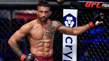 LAS VEGAS, NEVADA - AUGUST 31: Joanderson Brito of Brazil reacts after poking the eye of Diego Lopes of Brazil in their featherweight fight during Dana White's Contender Series season five week one at UFC APEX on August 31, 2021 in Las Vegas, Nevada. (Photo by Chris Unger/Zuffa LLC)