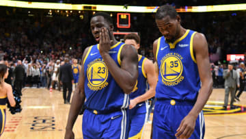 DENVER, CO - OCTOBER 21: Draymond Green #23 and Kevin Durant #35 of the Golden State Warriors walk off the court after losing to the Denver Nuggets at Pepsi Center on October 21, 2018 in Denver, Colorado. The Denver Nuggets defeated the Golden State Warriors 100-98. NOTE TO USER: User expressly acknowledges and agrees that, by downloading and or using this photograph, User is consenting to the terms and conditions of the Getty Images License Agreement. (Photo by Justin Tafoya/Getty Images)