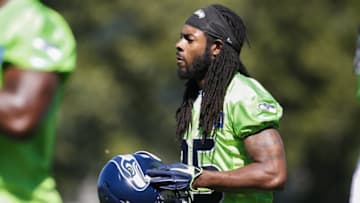 Jul 31, 2015; Renton, WA, USA; Seattle Seahawks cornerback Richard Sherman (25) walks to a drill during training camp practice at Virginia Mason Athletic Center. Mandatory Credit: Joe Nicholson-USA TODAY Sports