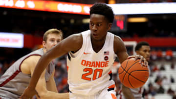 SYRACUSE, NEW YORK - NOVEMBER 13: Robert Braswell #20 of the Syracuse Orange drives to the basket during the second half of an NCAA basketball game against the Colgate Raiders at the Carrier Dome on November 13, 2019 in Syracuse, New York. (Photo by Bryan Bennett/Getty Images)
