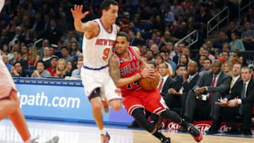 Apr 13, 2014; New York, NY, USA; Chicago Bulls guard D.J. Augustin (14) drives to the basket during the first half against New York Knicks guard Pablo Prigioni (9) at Madison Square Garden. Mandatory Credit: Jim O