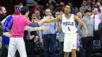 Jan 4, 2016; Philadelphia, PA, USA; Philadelphia 76ers guard Ish Smith (1) high fives fans after scoring against the Minnesota Timberwolves during the fourth quarter at Wells Fargo Center. The 76ers won 109-99. Mandatory Credit: Bill Streicher-USA TODAY Sports