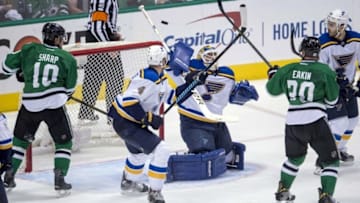 May 1, 2016; Dallas, TX, USA; Dallas Stars left wing Patrick Sharp (10) and center Cody Eakin (20) and St. Louis Blues defenseman Carl Gunnarsson (4) and goalie Brian Elliott (1) and defenseman Kevin Shattenkirk (22) look for the puck in midair during the overtime period in game two of the first round of the 2016 Stanley Cup Playoffs at the American Airlines Center. The Blues win 4-3 in overtime. Mandatory Credit: Jerome Miron-USA TODAY Sports