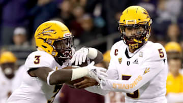 SEATTLE, WA - SEPTEMBER 22: Manny Wilkins #5 of the Arizona State Sun hands the ball off to Eno Benjamin #3 of the Arizona State Sun Devils against the Washington Huskies in the first quarter during their game at Husky Stadium on September 22, 2018 in Seattle, Washington. (Photo by Abbie Parr/Getty Images)
