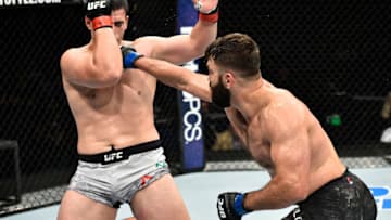 NORFOLK, VA - NOVEMBER 11: (R-L) Andrei Arlovski of Belarus punches Junior Albini of Brazil in their heavyweight bout during the UFC Fight Night event inside the Ted Constant Convention Center on November 11, 2017 in Norfolk, Virginia. (Photo by Brandon Magnus/Zuffa LLC/Zuffa LLC via Getty Images)