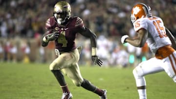 Oct 29, 2016; Tallahassee, FL, USA; Florida State Seminoles running back Dalvin Cook (4) outruns Clemson linebacker Korrin Wiggins (15) at Doak Campbell Stadium. Clemson won 37-34. Mandatory Credit: Glenn Beil-USA TODAY Sports