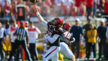 LUBBOCK, TX - SEPTEMBER 29: Alan Bowman #10 of the Texas Tech Red Raiders passes the ball during the first half of the game against the West Virginia Mountaineers on September 29, 2018 at Jones AT&T Stadium in Lubbock, Texas. (Photo by John Weast/Getty Images)