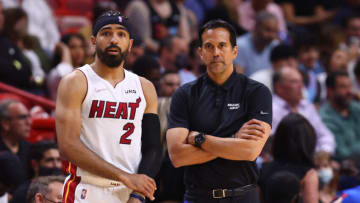 Gabe Vincent #2 and Erik Spoelstra of the Miami Heat look on against the Chicago Bulls(Photo by Michael Reaves/Getty Images)