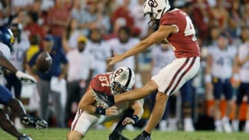 Oklahoma's Gabe Brkic (47) kicks a field goal to tie the game during a college football game between the University of Oklahoma Sooners (OU) and the West Virginia Mountaineers at Gaylord Family-Oklahoma Memorial Stadium in Norman, Okla., Saturday, Sept. 25, 2021. Oklahoma won 16-13.Lx13397