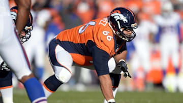 Dec 7, 2014; Denver, CO, USA; Denver Broncos center Manny Ramirez (66) during the first quarter against the Buffalo Bills at Sports Authority Field at Mile High. Mandatory Credit: Ron Chenoy-USA TODAY Sports