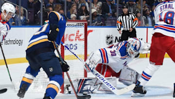 Henrik Lundqvist #30 of the New York Rangers blocks a shot