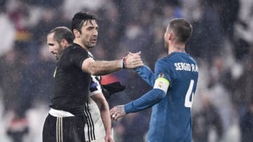 TURIN, ITALY - APRIL 03: Gianluigi Buffon of Juventus and Sergio Ramos of Real Madrid in action during the UEFA Champions League Quarter Final Leg One match between Juventus and Real Madrid at Allianz Stadium on April 3, 2018 in Turin, Italy. (Photo by Daniele Badolato - Juventus FC/Juventus FC via Getty Images)