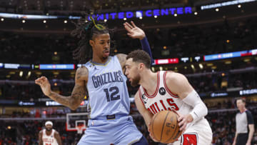 Zach LaVine sizes up Ja Morant during the Chicago Bulls comeback of the year. (Kamil Krzaczynski-USA TODAY Sports)