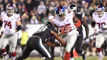 Oct 19, 2015; Philadelphia, PA, USA; New York Giants tight end Will Tye (45) is tackled by Philadelphia Eagles outside linebacker Jordan Hicks (58) during the first quarter at Lincoln Financial Field. Mandatory Credit: Eric Hartline-USA TODAY Sports