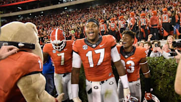 Oct 17, 2015; Athens, GA, USA; Georgia Bulldogs players linebacker Lorenzo Carter (7) and linebacker Davin Bellamy (17) and defensive back Kirby Choates (33) react after defeating the Missouri Tigers at Sanford Stadium. Georgia defeated Missouri 9-6. Mandatory Credit: Dale Zanine-USA TODAY Sports