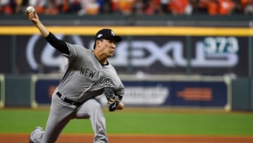 HOUSTON, TX - OCTOBER 12: Masahiro Tanaka #19 of the New York Yankees pitches during Game 1 of the ALCS between the New York Yankees and the Houston Astros at Minute Maid Park on Saturday, October 12, 2019 in Houston, Texas. (Photo by Cooper Neill/MLB Photos via Getty Images)
