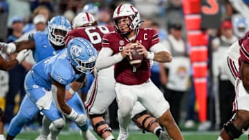 South Carolina football quarterback Spencer Rattler running for his life on Saturday. Mandatory Credit: Jim Dedmon-USA TODAY Sports