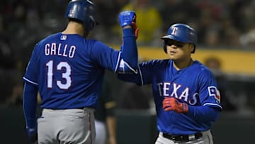 OAKLAND, CA - APRIL 04: Shin-Soo Choo #17 of the Texas Rangers is congratulated by Joey Gallo #13 after Choo hit a solo home run against the Oakland Athletics in the top of the ninth inning at the Oakland Alameda Coliseum on April 4, 2018 in Oakland, California. (Photo by Thearon W. Henderson/Getty Images)