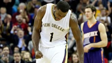 Dec 30, 2014; New Orleans, LA, USA; New Orleans Pelicans forward Tyreke Evans (1) celebrates after a basket during the fourth quarter of a game against the Phoenix Suns at Smoothie King Center. The Pelicans defeated the Suns 110-106. Mandatory Credit: Derick E. Hingle-USA TODAY Sports