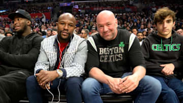 LOS ANGELES, CA - NOVEMBER 20: Boxer Floyd Mayweather Jr. and UFC President Dana White seated together during the Los Angeles Clippers and the Boston Celtics basketball game at Staples Center on November 20, 2019 in Los Angeles, California. NOTE TO USER: User expressly acknowledges and agrees that, by downloading and/or using this Photograph, user is consenting to the terms and conditions of the Getty Images License Agreement. (Photo by Kevork Djansezian/Getty Images)