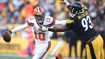 Jan 1, 2017; Pittsburgh, PA, USA; Cleveland Browns quarterback Robert Griffin III (10) scrambles against pressure by Pittsburgh Steelers nose tackle Dan McCullers-Sanders (93) in overtime at Heinz Field. The Steelers won 27-24 in overtime. Mandatory Credit: Charles LeClaire-USA TODAY Sports