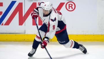 Mar 22, 2016; Ottawa, Ontario, CAN; Washington Capitals defenseman Dmitry Orlov (9) shoots the puck in the third period against the Ottawa Senators at the Canadian Tire Centre. The Capitals defeated the Senators 4-2. Mandatory Credit: Marc DesRosiers-USA TODAY Sports