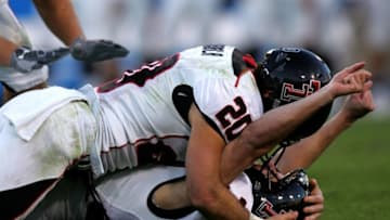 JACKSONVILLE, FL - JANUARY 01: Trent Nickerson #30 of the Texas Tech Red Raiders and Danny Amendola #20 celebrate after scoring the winning field goal at the Gator Bowl against the Virginia Cavaliers at Jacksonville Municipal Stadium on January 1, 2008 in Jacksonville, Florida. (Photo by Sam Greenwood/Getty Images)