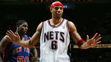 EAST RUTHERFORD, NJ - APRIL 17: Kenyon Martin #6 of the New Jersey Nets stands in front of Mike Sweetney #50 of the New York Knicks in Game One of the Eastern Conference Quarterfinals during the 2004 NBA Playoffs at Continental Airlines Arena on April 17, 2004 in East Rutherford, New Jersey. The Nets won 107-83. NOTE TO USER: User expressly acknowledges and agrees that, by downloading and/or using this Photograph, User is consenting to the terms and conditions of the Getty Images License Agreement. (Photo by Jesse D. Garrabrant/NBAE via Getty Images)