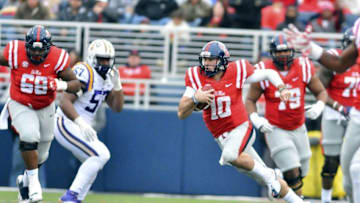 Nov 21, 2015; Oxford, MS, USA; Mississippi Rebels quarterback Chad Kelly (10) runs the ball during the first quarter of the game against the LSU Tigers at Vaught-Hemingway Stadium. Mandatory Credit: Matt Bush-USA TODAY Sports