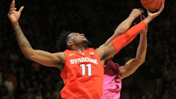 BLACKSBURG, VA - JANUARY 26: Oshae Brissett #11 of the Syracuse Orange reaches for a rebound in the first half against the Virginia Tech Hokies at Cassell Coliseum on January 26, 2019 in Blacksburg, Virginia. (Photo by Lauren Rakes/Getty Images)