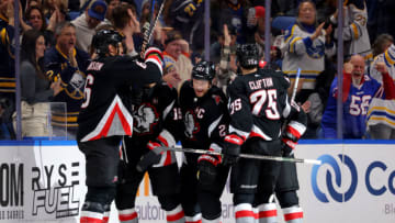 Dec 9, 2023; Buffalo, New York, USA; Buffalo Sabres right wing Kyle Okposo (21) celebrates his goal with teammates during the third period against the Montreal Canadiens at KeyBank Center. Mandatory Credit: Timothy T. Ludwig-USA TODAY Sports