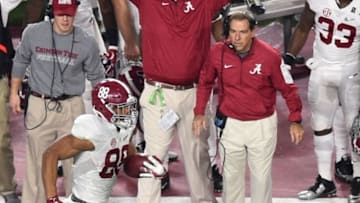 Jan 11, 2016; Glendale, AZ, USA; Alabama Crimson Tide head coach Nick Saban watches tight end O.J. Howard (88) run the ball during the fourth quarter against the Clemson Tigers in the 2016 CFP National Championship at University of Phoenix Stadium. Mandatory Credit: Gary A. Vasquez-USA TODAY Sports