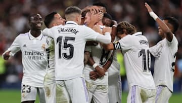 Real Madrid's German midfielder Toni Kroos (C) celebrates with teammates after scoring his team's second goal during the Spanish league football match between Real Madrid CF and Cadiz CF at the Santiago Bernabeu stadium in Madrid on November 10, 2022. (Photo by Pierre-Philippe Marcou / AFP) (Photo by PIERRE-PHILIPPE MARCOU/AFP via Getty Images)