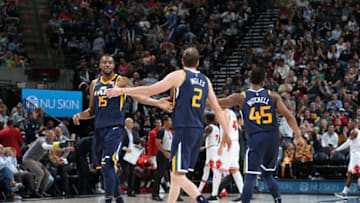 SALT LAKE CITY, UT - NOVEMBER 22: Derrick Favors #15, Joe Ingles #2, and Donovan Mitchell #45 of the Utah Jazz react during game against the Chicago Bulls on November 22, 2017 at Vivint Smart Home Arena in Salt Lake City, Utah. NOTE TO USER: User expressly acknowledges and agrees that, by downloading and or using this Photograph, User is consenting to the terms and conditions of the Getty Images License Agreement. Mandatory Copyright Notice: Copyright 2017 NBAE (Photo by Melissa Majchrzak/NBAE via Getty Images)