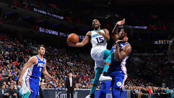 PHILADELPHIA,PA - MARCH 19 : Kemba Walker #15 of the Charlotte Hornets puts up the shot against the Philadelphia 76ers at Wells Fargo Center on March 19, 2018 in Philadelphia, Pennsylvania NOTE TO USER: User expressly acknowledges and agrees that, by downloading and/or using this Photograph, user is consenting to the terms and conditions of the Getty Images License Agreement. Mandatory Copyright Notice: Copyright 2018 NBAE (Photo by Jesse D. Garrabrant/NBAE via Getty Images)