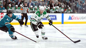 Apr 2, 2022; San Jose, California, USA; Dallas Stars defenseman John Klingberg (3) and San Jose Sharks left wing John Leonard (43) during the first period at SAP Center at San Jose. Mandatory Credit: Darren Yamashita-USA TODAY Sports