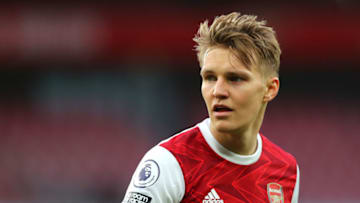 LONDON, ENGLAND - MARCH 14: Martin Odegaard of Arsenal during the Premier League match between Arsenal and Tottenham Hotspur at Emirates Stadium on March 14, 2021 in London, England. Sporting stadiums around the UK remain under strict restrictions due to the Coronavirus Pandemic as Government social distancing laws prohibit fans inside venues resulting in games being played behind closed doors. (Photo by Chloe Knott - Danehouse/Getty Images)