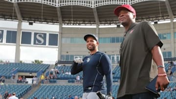 Mar 24, 2016; Tampa, FL, USA; Tampa Bay Rays first baseman James Loney (21) and Tampa Bay Buccaneer quarterback Jameis Winston (3) talk prior to the game against the New York Yankees at George M. Steinbrenner Field. Mandatory Credit: Kim Klement-USA TODAY Sports