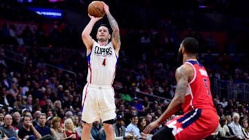 LOS ANGELES, CA - MARCH 29: JJ Redick #4 of the LA Clippers shoots a three in front of Markieff Morris #5 of the Washington Wizards during a 133-124 Clipper win at Staples Center on March 29, 2017 in Los Angeles, California. NOTE TO USER: User expressly acknowledges and agrees that, by downloading and or using this photograph, User is consenting to the terms and conditions of the Getty Images License Agreement. (Photo by Harry How/Getty Images)