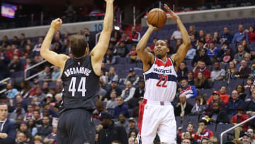 Dec 30, 2016; Washington, DC, USA; Washington Wizards forward Otto Porter Jr. (22) shoots the ball over Brooklyn Nets guard Bojan Bogdanovic (44) in the first quarter at Verizon Center. Mandatory Credit: Geoff Burke-USA TODAY Sports