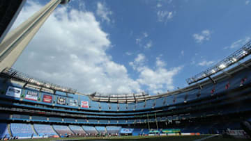 TORONTO, CANADA - JULY 11: A general view of the Rogers Centre and the CN Tower before the Toronto Argonauts CFL game against the Saskatchewan Roughriders on July 11, 2013 at Rogers Centre in Toronto, Ontario, Canada. (Photo by Tom Szczerbowski/Getty Images)