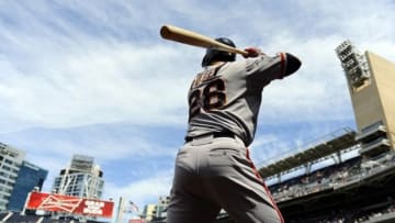Sep 2, 2013; San Diego, CA, USA; San Francisco Giants catcher Buster Posey (28) on deck prior to his at bat in the fourth inning against the San Diego Padres at Petco Park. Mandatory Credit: Christopher Hanewinckel-USA TODAY Sports
